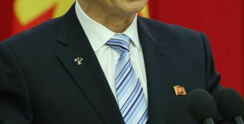 North Korean officials appear wearing Kim Jong Un loyalty badges for first time