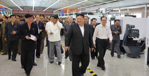 Kim Jong Un tours new weapons factory with party plenum attendees