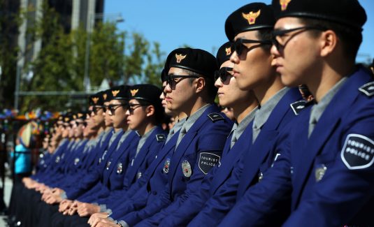 the-defector-beat-the-police-who-watch-n-koreans-as-they-settle-nk-news