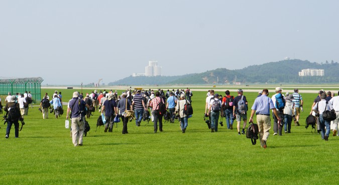 Aviation enthusiasts on the move | Photo credit: NK News