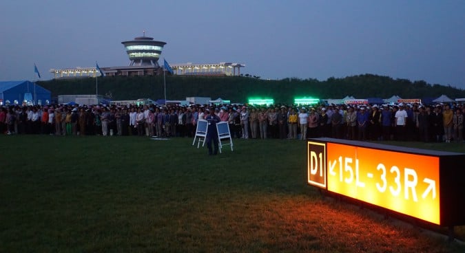 Koreans waiting to go home | Photo credit: NK News