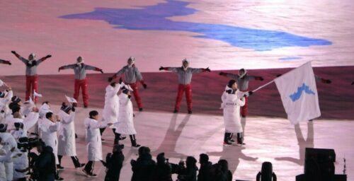 Two Koreas march under unification flag at Winter Olympics Opening Ceremony