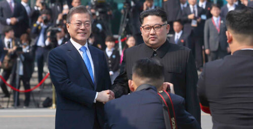 Kim Jong Un and Moon Jae-in share historic first handshake at Panmunjom