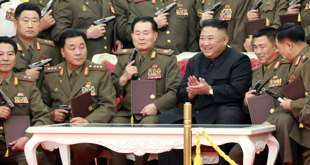 Kim Jong Un gifts guns to army officers as North Korea ...