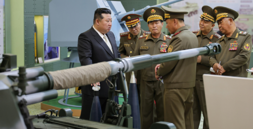 Kim Jong Un vows to overcome failed satellite launch at military academy visit