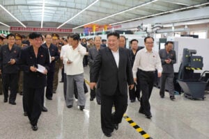 Kim Jong Un tours new weapons factory with party plenum attendees